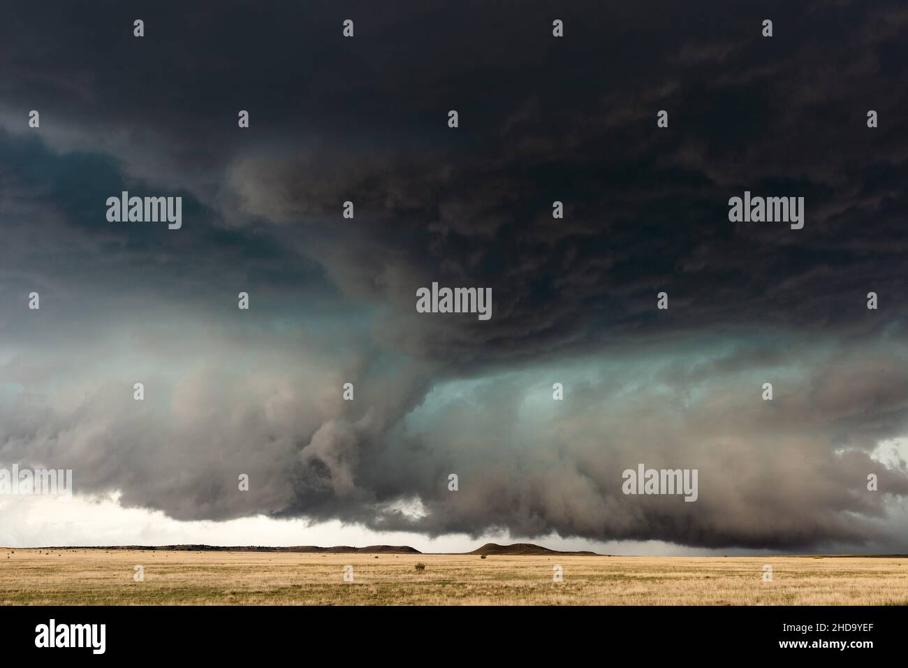 Dramatic sky with ominous storm clouds beneath a supercell thunderstorm near Kim, Colorado Stock Photo