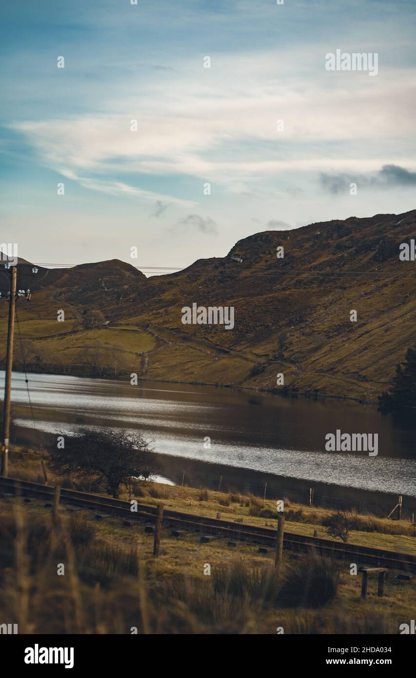 Scenic view of the farmland and mountain in Ireland under a gloomy sky Stock Photo