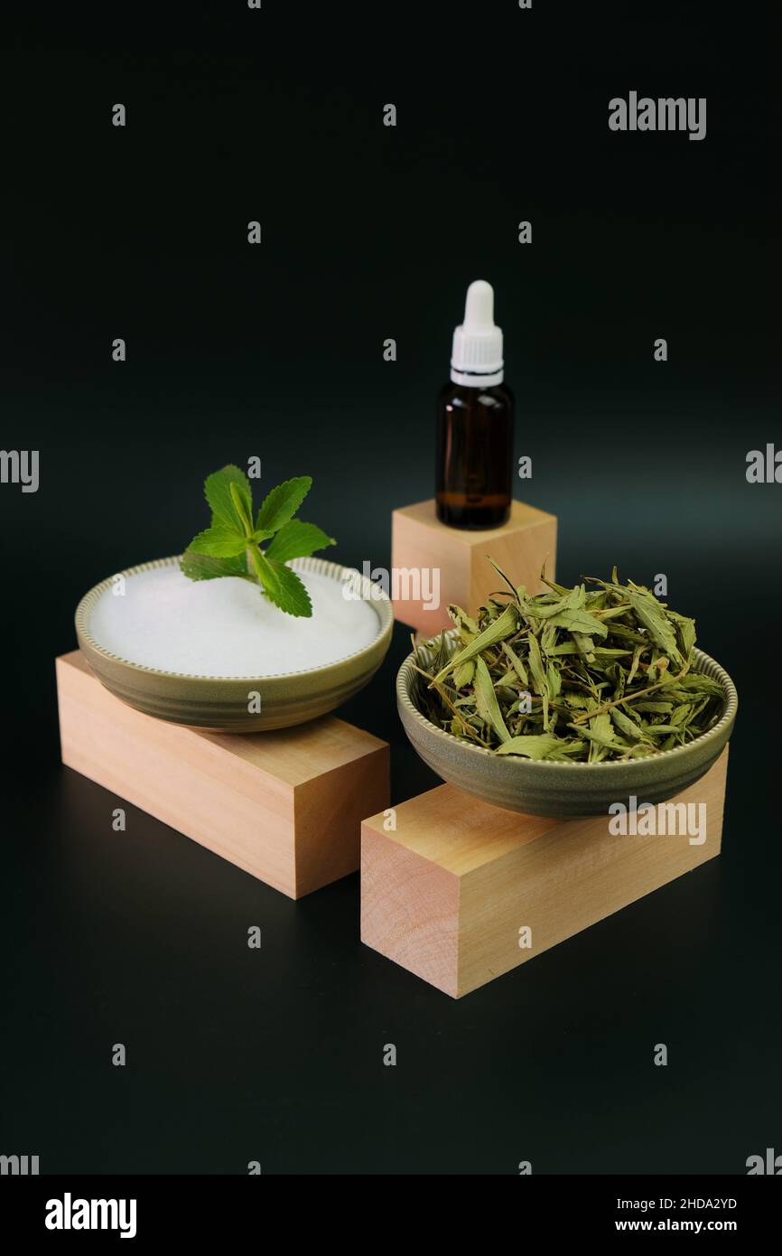 Dried stevia leaves,green branch in stevia powder and stevia liquid on