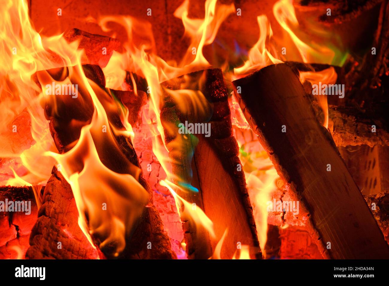 flame. Fire and flames Sparks and flames close-up. Fireplace with logs ...
