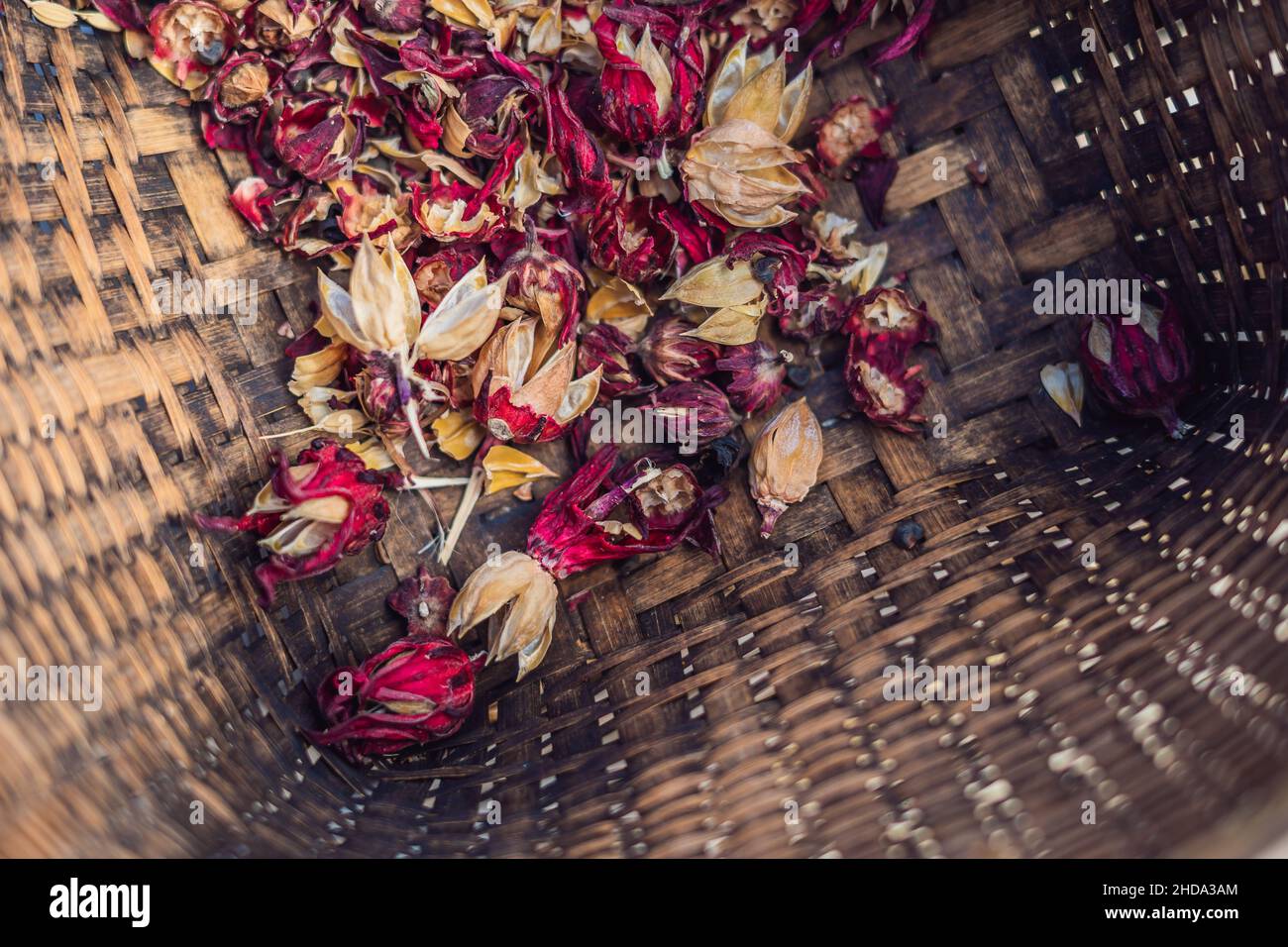 Heap of dried roselle flower. Red fruit tea carcade. Hibiscus sabdariffa. Top view Stock Photo