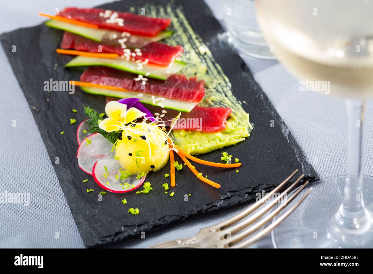 Tuna carpaccio with avocado sauce Stock Photo Alamy