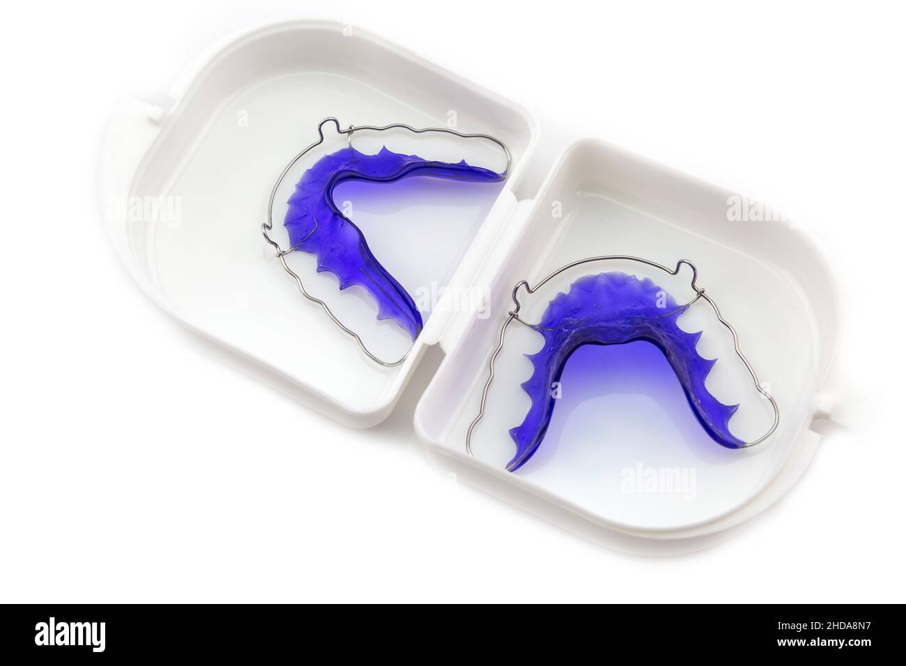 Blue Acrylic dental retainer isolated in white box on white background Stock Photo