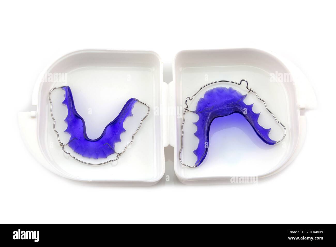 Blue Acrylic dental retainer isolated in white box on white background Stock Photo