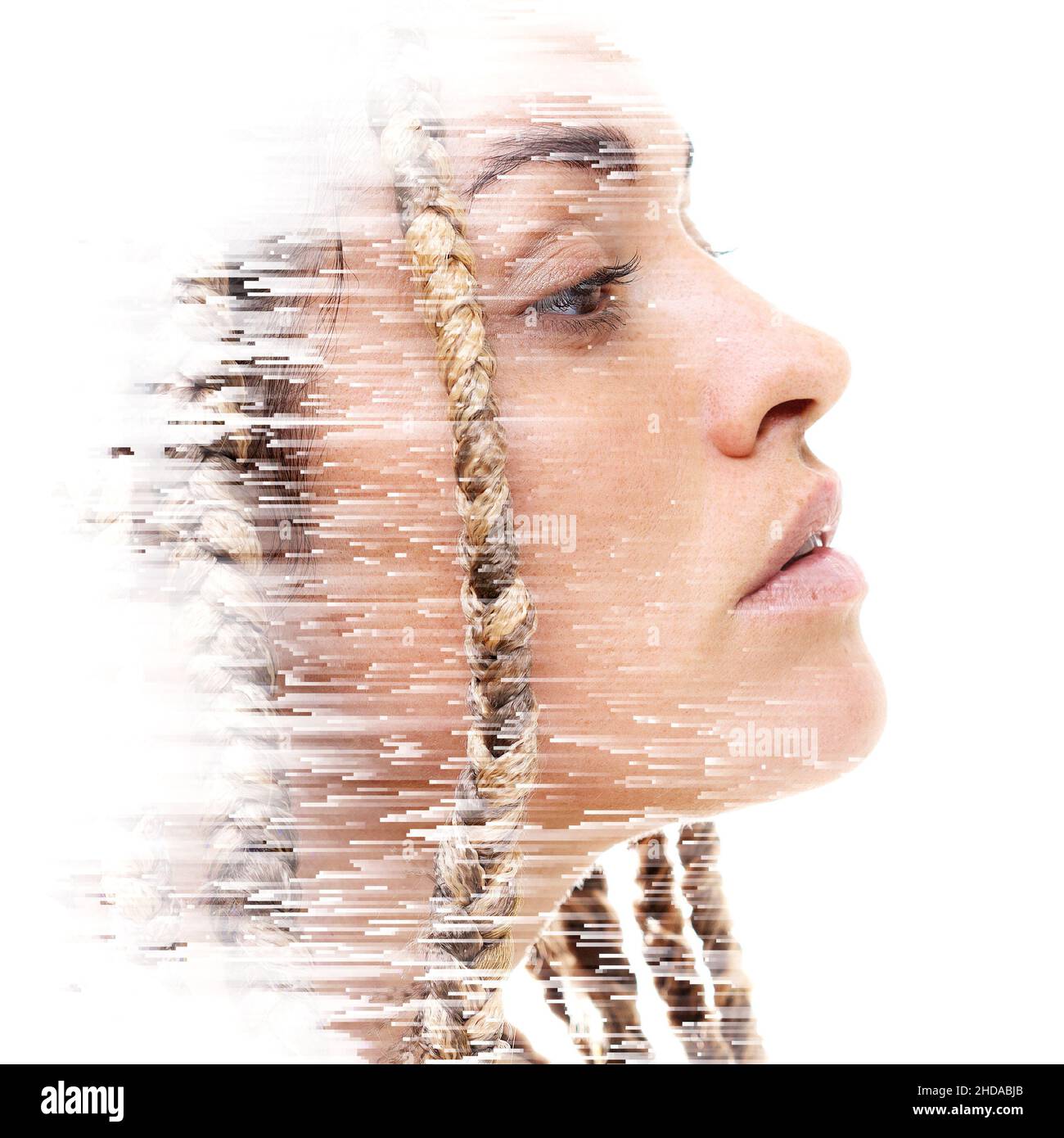 A double exposure portrait of an attractive woman combined with digital ...