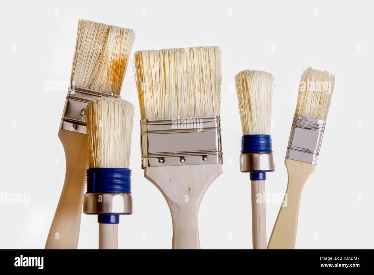 a paint brush dipped in red paint, isolated Stock Photo