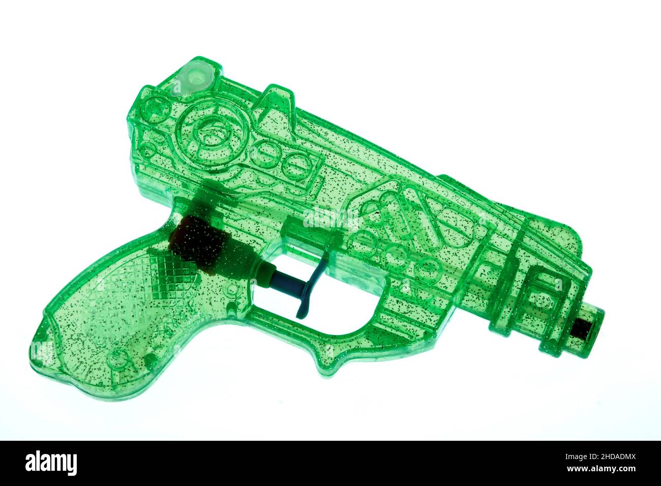 green plastic water gun isolated Stock Photo
