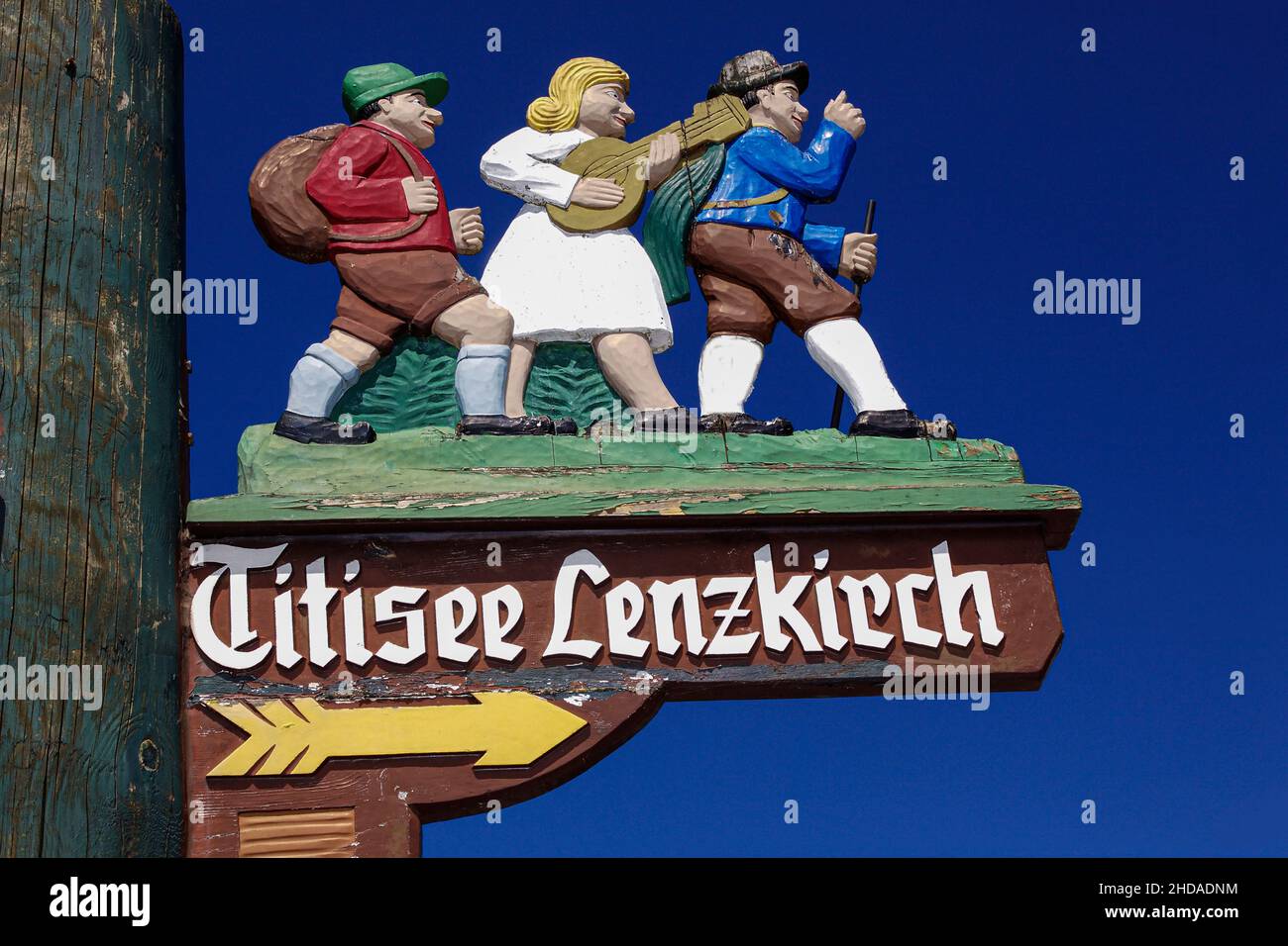 ornately carved wood signpost in Lenzkirch in the Schwarzwald Stock Photo