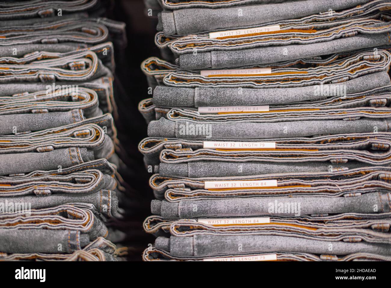 Stacked denim jeans in hi-res stock photography and images - Alamy