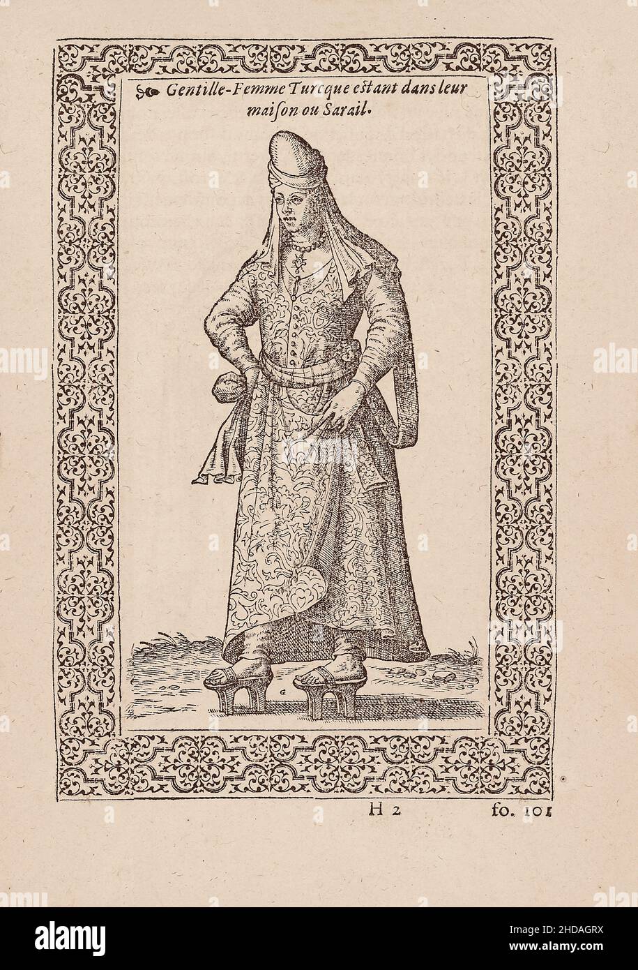 The 16th century engraving of Turkish woman in traditional dress being in their house or Sarail. 1577 By Nicolas de Nicolay (1517-1583) Stock Photo