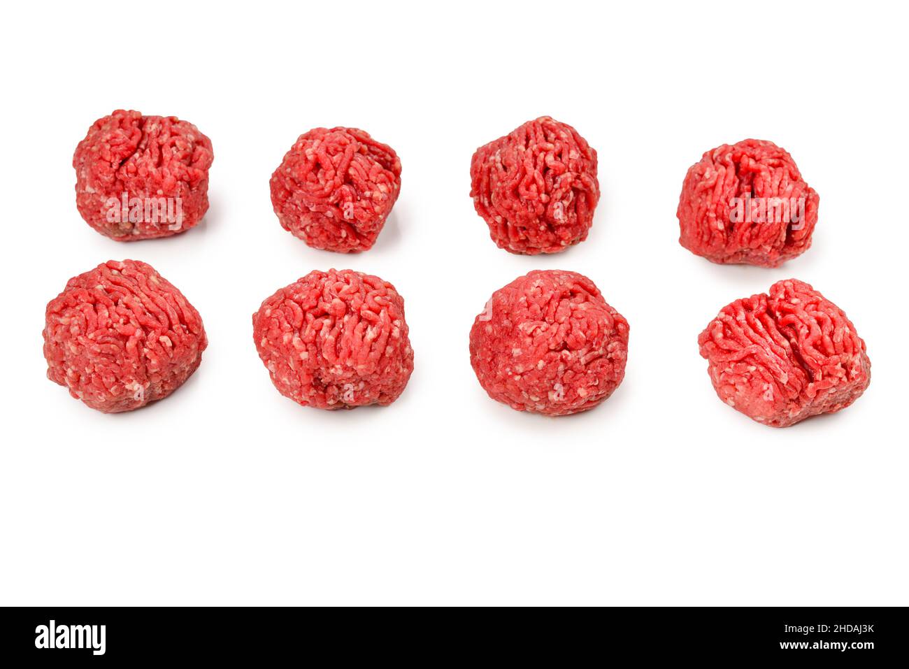 Raw meat balls isolated on white background. Stock Photo