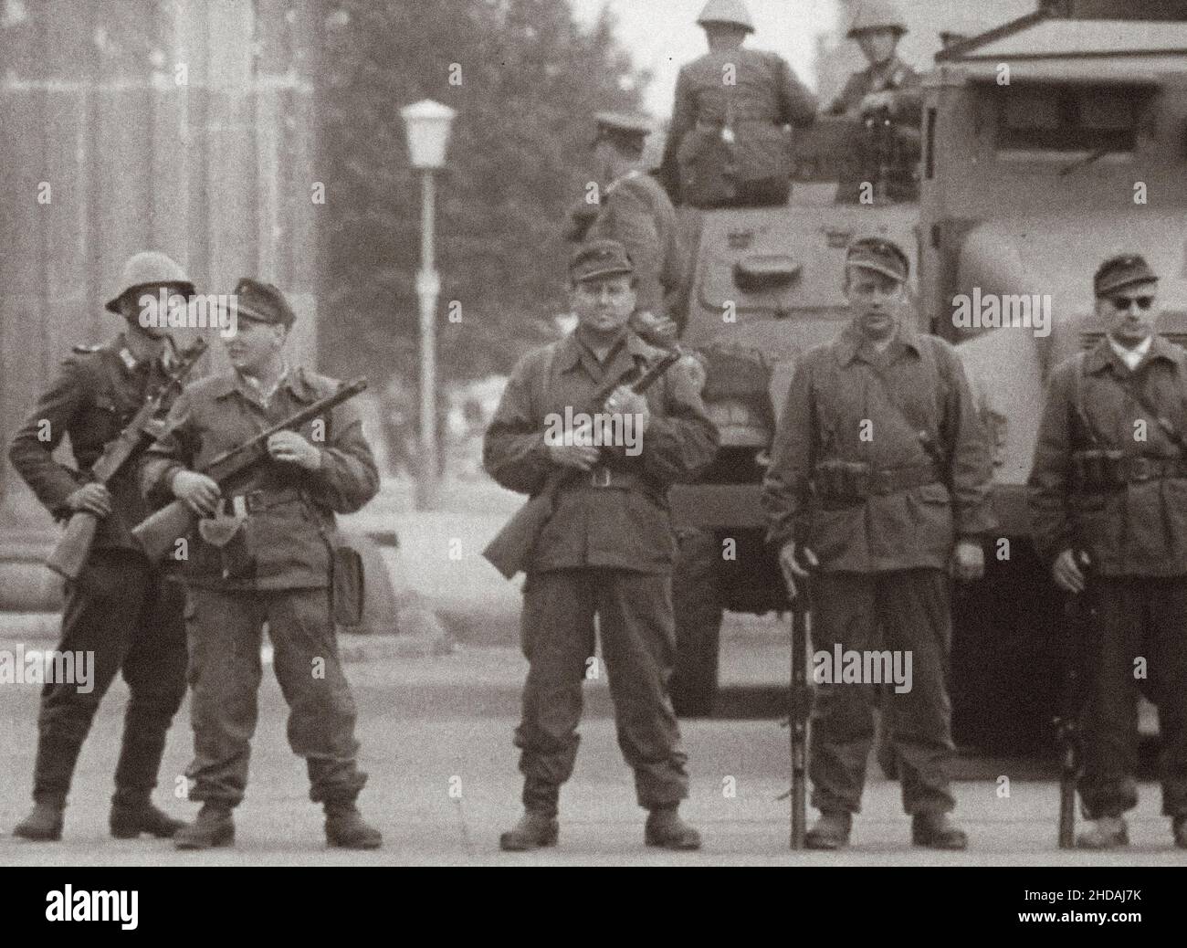 Berlin Crisis of 1961. Start of the construction of the Berlin Wall. East German Combat Groups of the Working Class ('Betriebskampfgruppen') with sovi Stock Photo