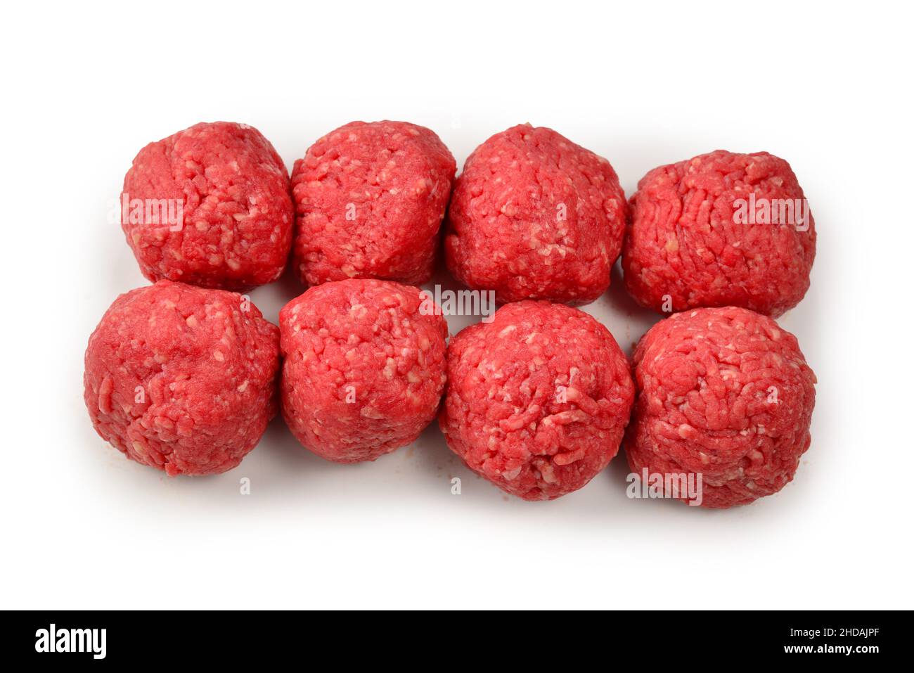Raw meat balls isolated on white background. Stock Photo