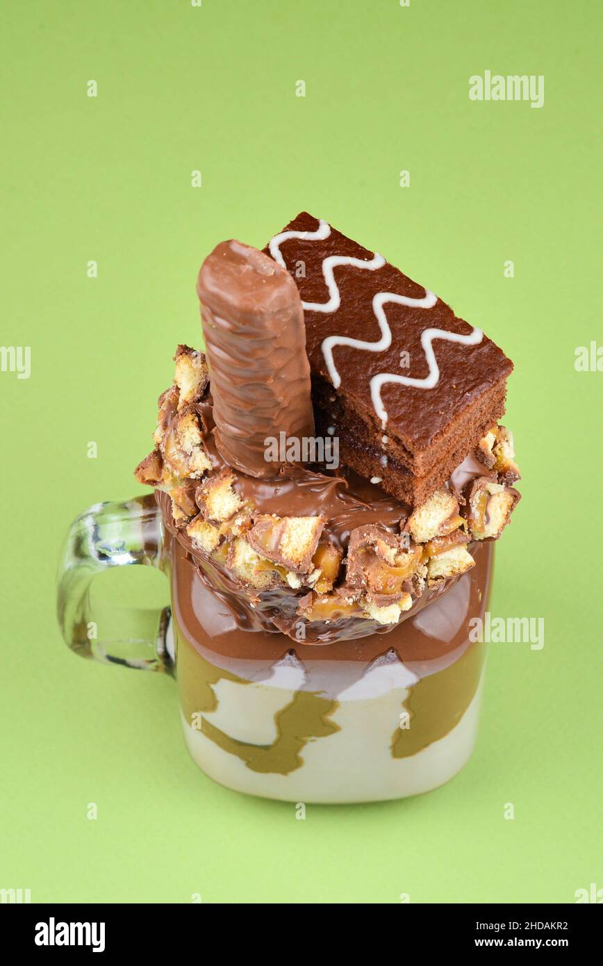 Chocolate extreme milkshake with brownie cake, chocolate paste and