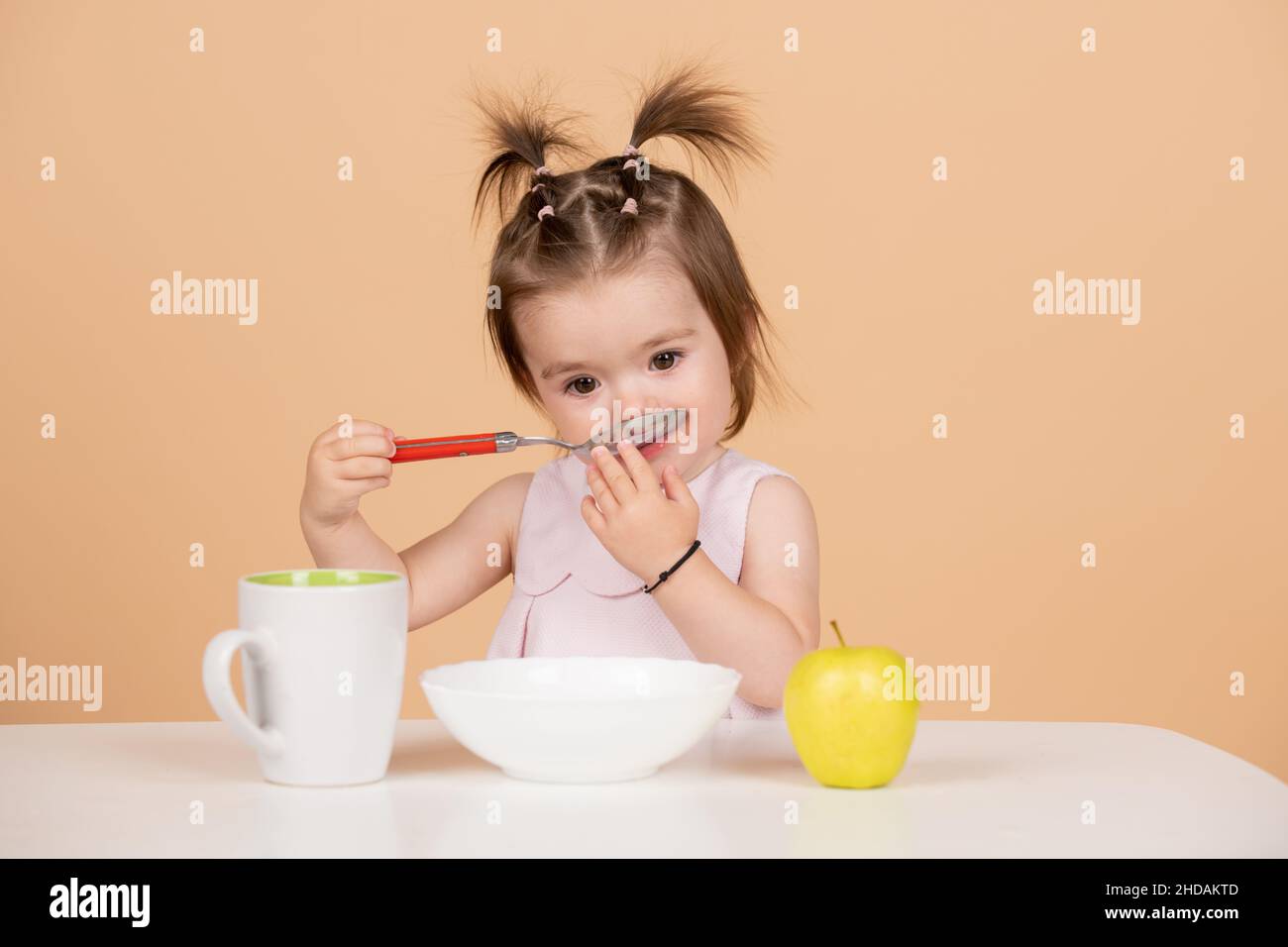 Cute funny babies eating, baby food, Kid girl eating healthy food Stock ...