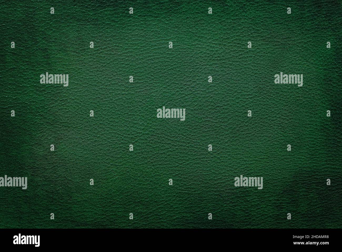 Old vintage green leather texture closeup can be used as background