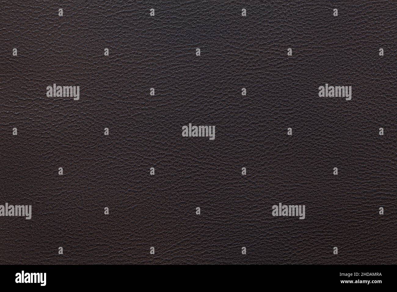 dark brown leather texture closeup can be used as background Stock Photo
