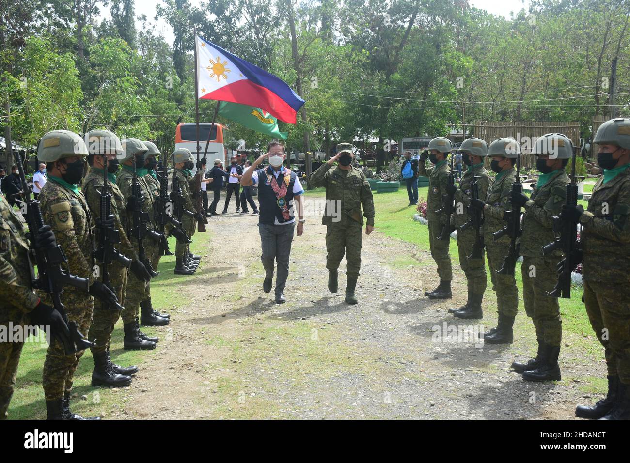 Bais, Philippines. 05th Jan, 2022. DPWH acting Secretary Roger G. Mercad, Lt. Gen. Robert C. Dauz PA Commander, Visayas Command, AFP with governor Governador Roel Ragay Degamo checked the devastation brought about by Typhoon Odette in Bais City. They conducted site visit and inspected the on-going joint clearing operations by LGU-DPWH. (currently undertaking massive clearing activities along Negros, Cebu and Bohol) (Photo by Joseph C. Ceriales/Pacific Press) Credit: Pacific Press Media Production Corp./Alamy Live News Stock Photo