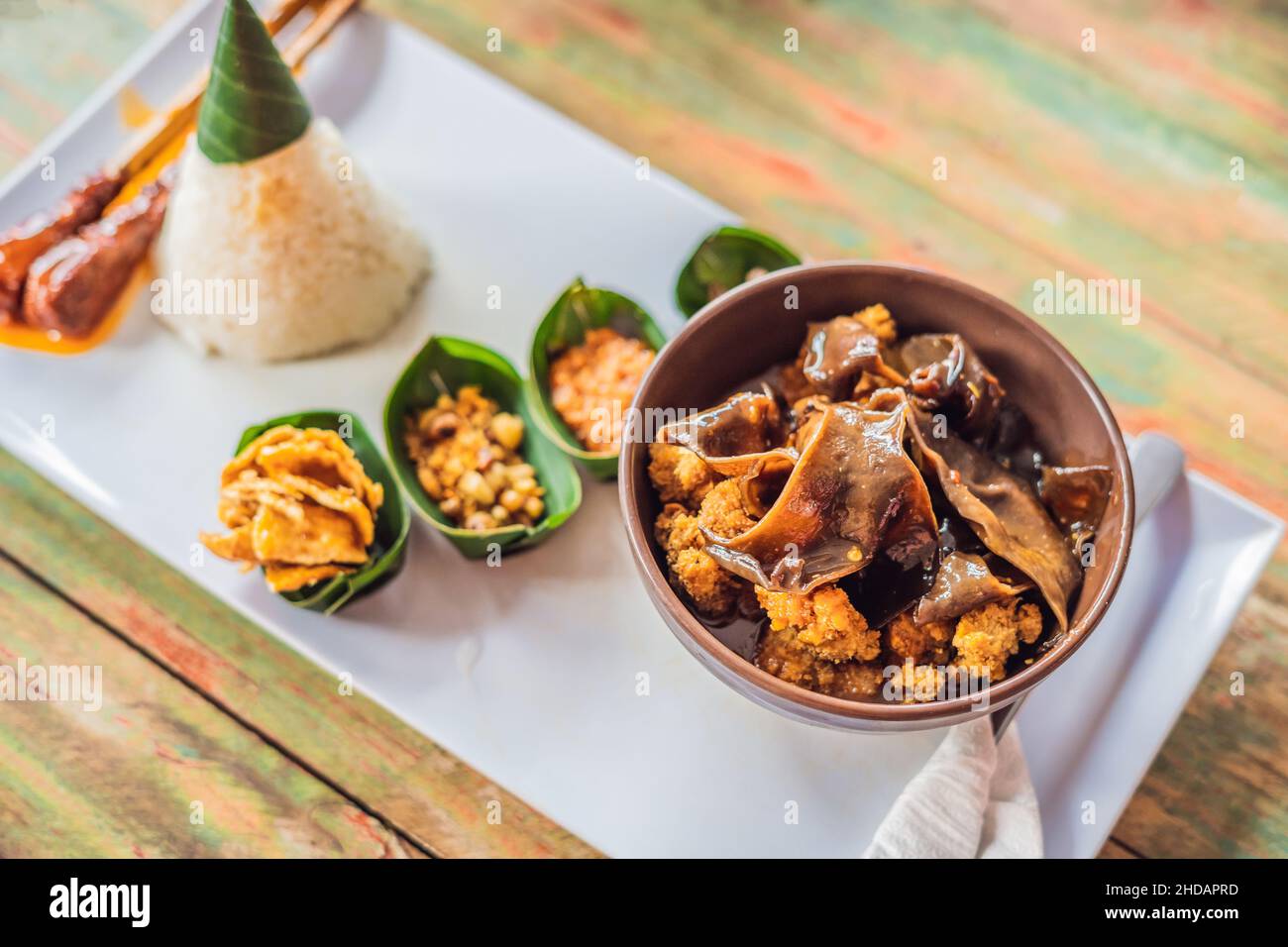 Lifestyle food. A dish consisting of rice, fried fish with wood