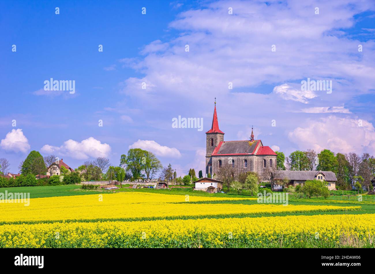 Beautiful scenery of the Church of St. John the Baptist in its rural setting in Ujezd pod Troskami, Bohemian Paradise (Cesky Raj), Czech Republic. Stock Photo