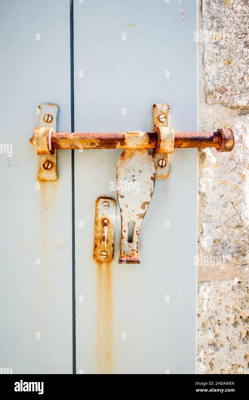 Old rusty lock on a white wooden door Stock Photo - Alamy