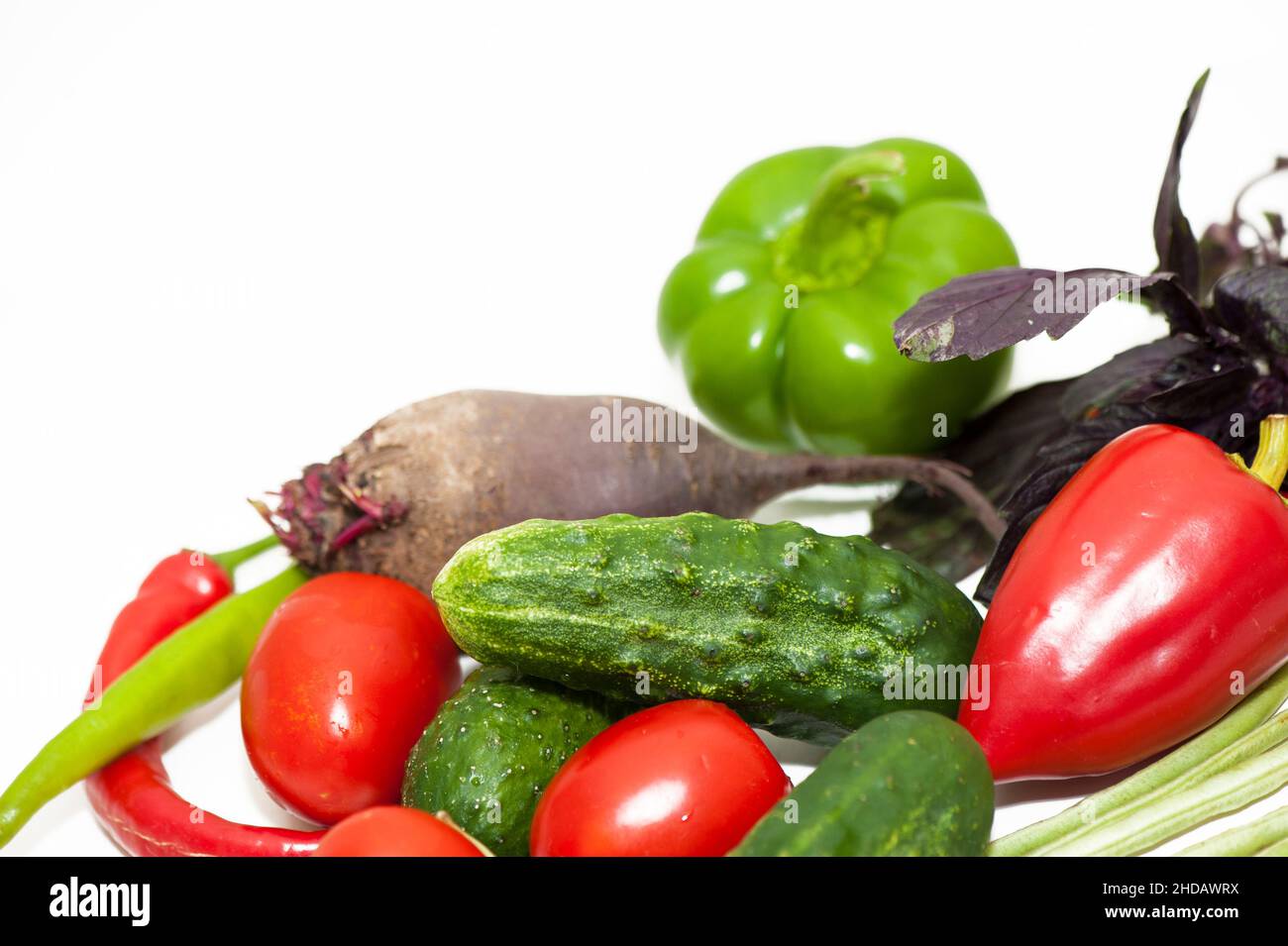 Vegetables cucumbers, tomatoes, beets, on a white background Stock Photo