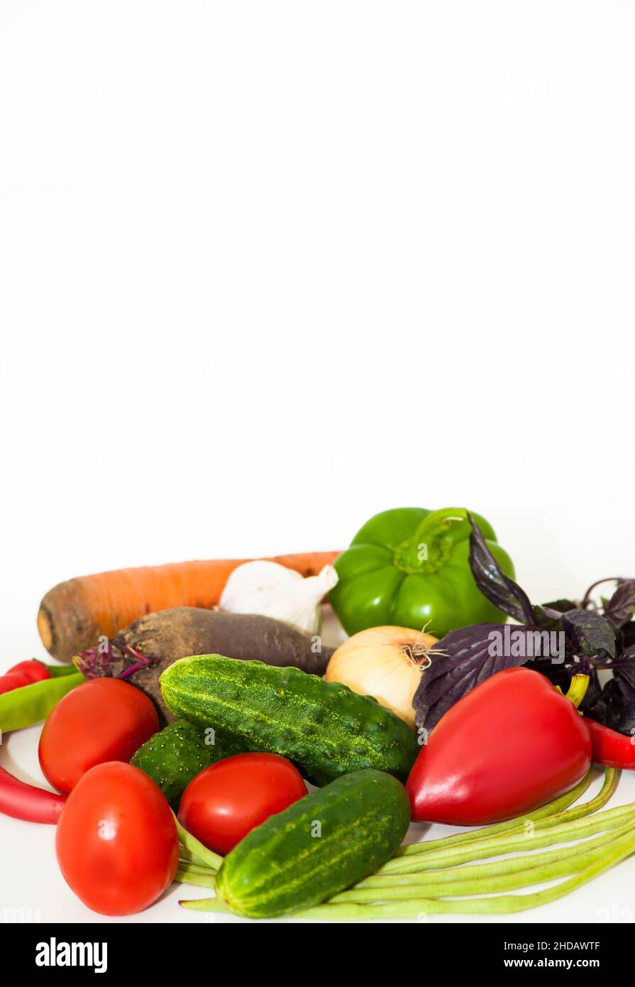 Vegetables cucumbers, tomatoes, beets, on a white background Stock Photo