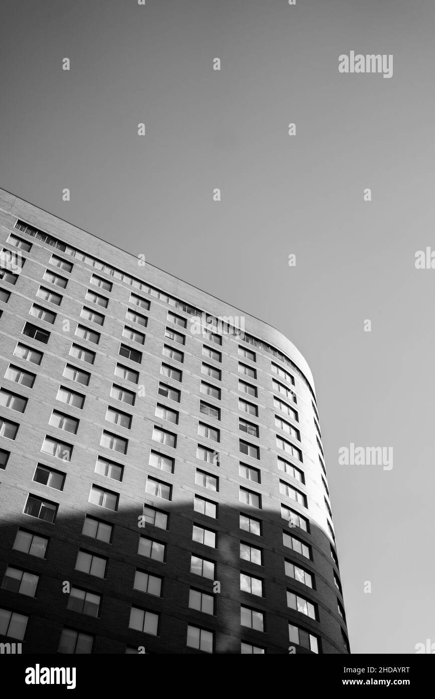 Vertical grayscale shot of the hotel in downtown Edmonton, Canada. Stock Photo