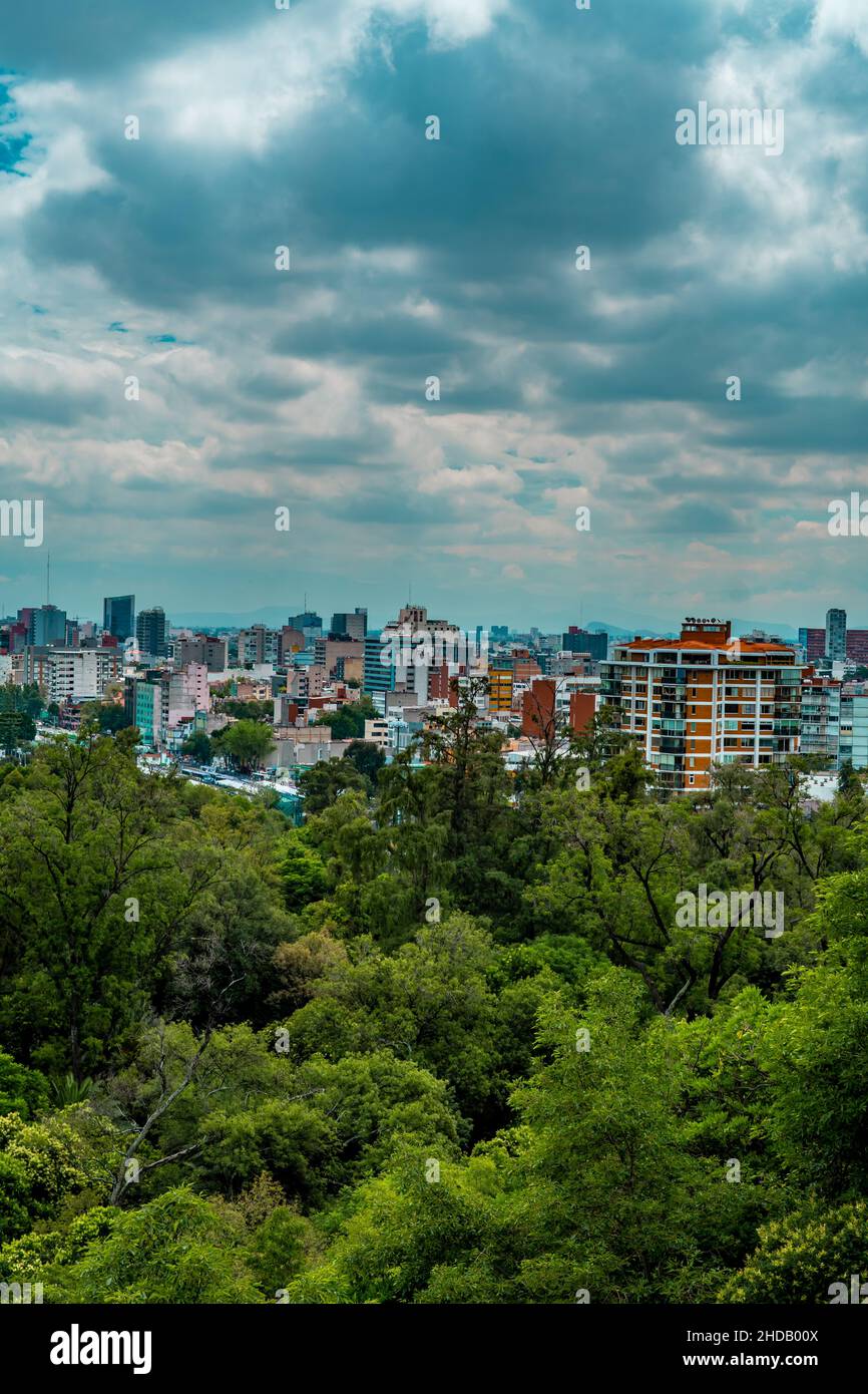 Panoramic view the skyline of downtown Mexico-City seen from Chapultepec Castle on a gloomy day Stock Photo