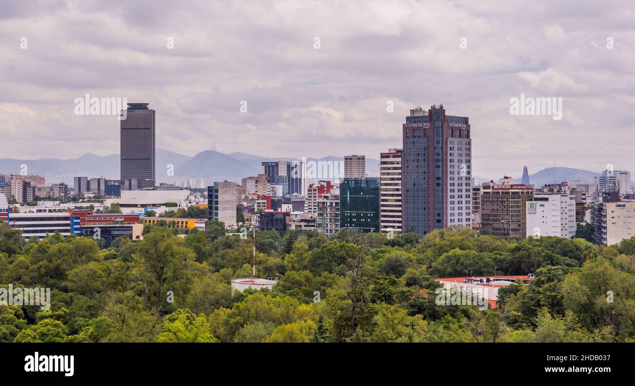 Panoramic view the skyline of downtown Mexico-City seen from Chapultepec Castle on a moody day Stock Photo