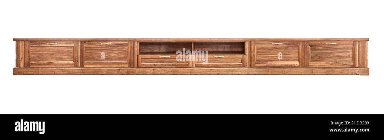 Elegant new TV cabinet made of veneer and solid walnut lumber with gold handles isolated on white background Stock Photo