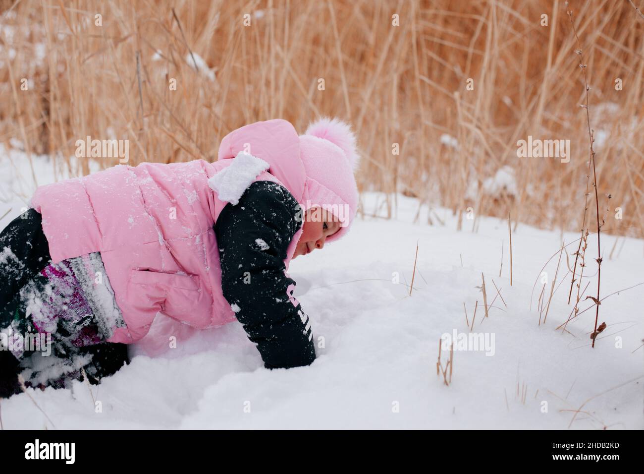 Children Wearing Snow Clothes In Winter High-Res Stock Photo