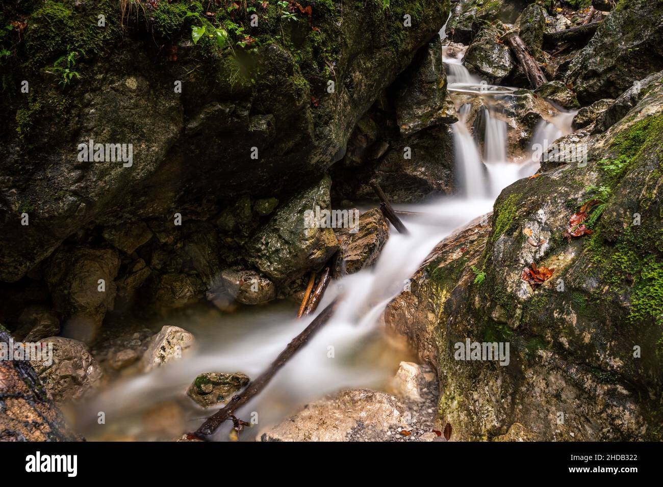 Stream Between Two Rocks Beautiful stream between rocks in hi-res stock photography and images ...