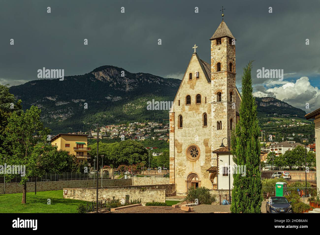 Romanesque church of Sant'Apollinare in Trento, along the Adige river. Trento, autonomous province of Trento, Trentino-Alto Adige, Italy, Europe Stock Photo
