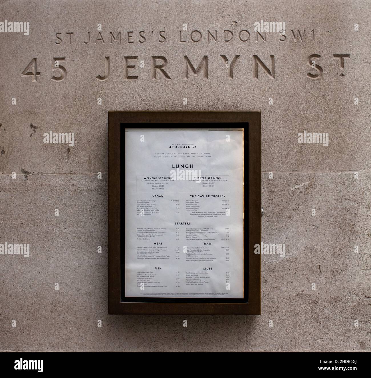 Restaurant 45 Jermyn St, London; name engraved into to the wall and menu card in frame. Owned by Fortnum & Mason Stock Photo