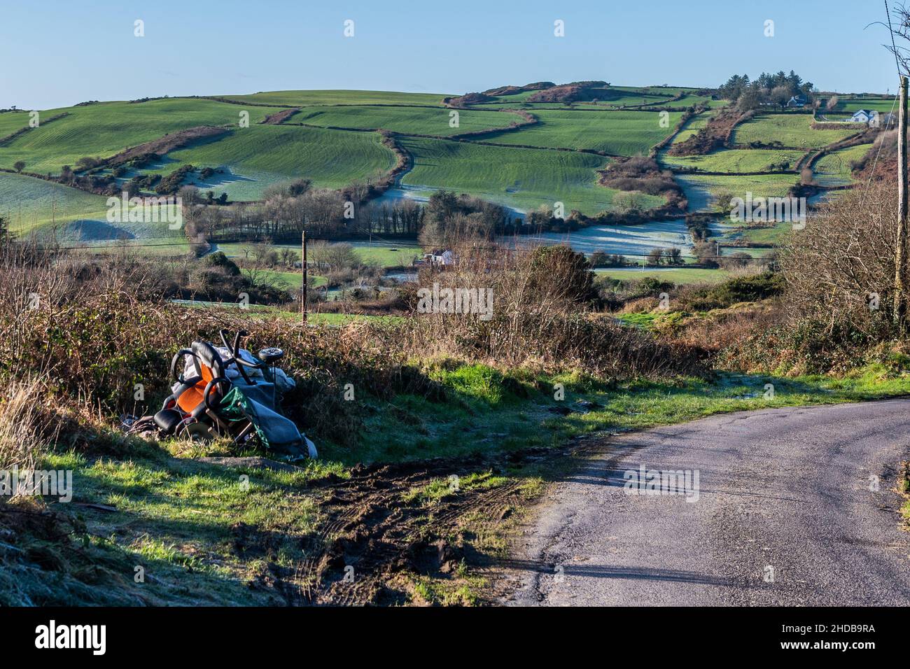 Rosscarbery, West Cork, Ireland. 5th Jan, 2022. Household rubbish has been dumped in the countryside near Rosscarbery in West Cork. A local resident out walking discovered the rubbish last night, which consists of carpets, chairs, a pushchair and other garbage. Credit: AG News/Alamy Live News Stock Photo