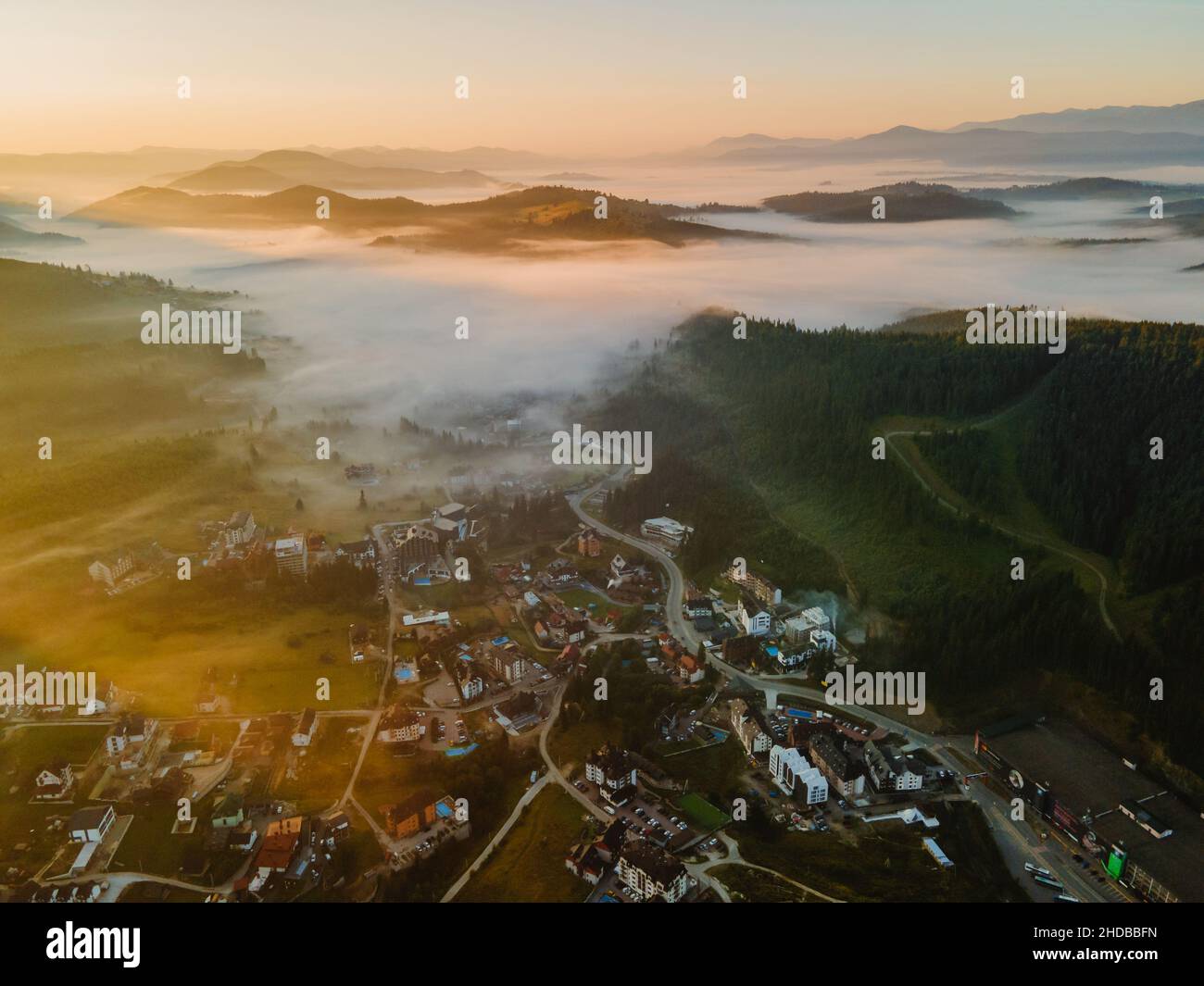 aerial view of bukovel village in ukrainian carpathian mountain range ...