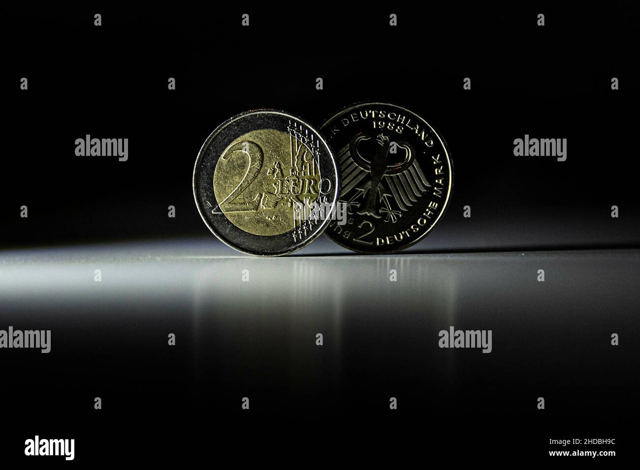 A two euro coin and two German marks recorded in Berlin, January 5th