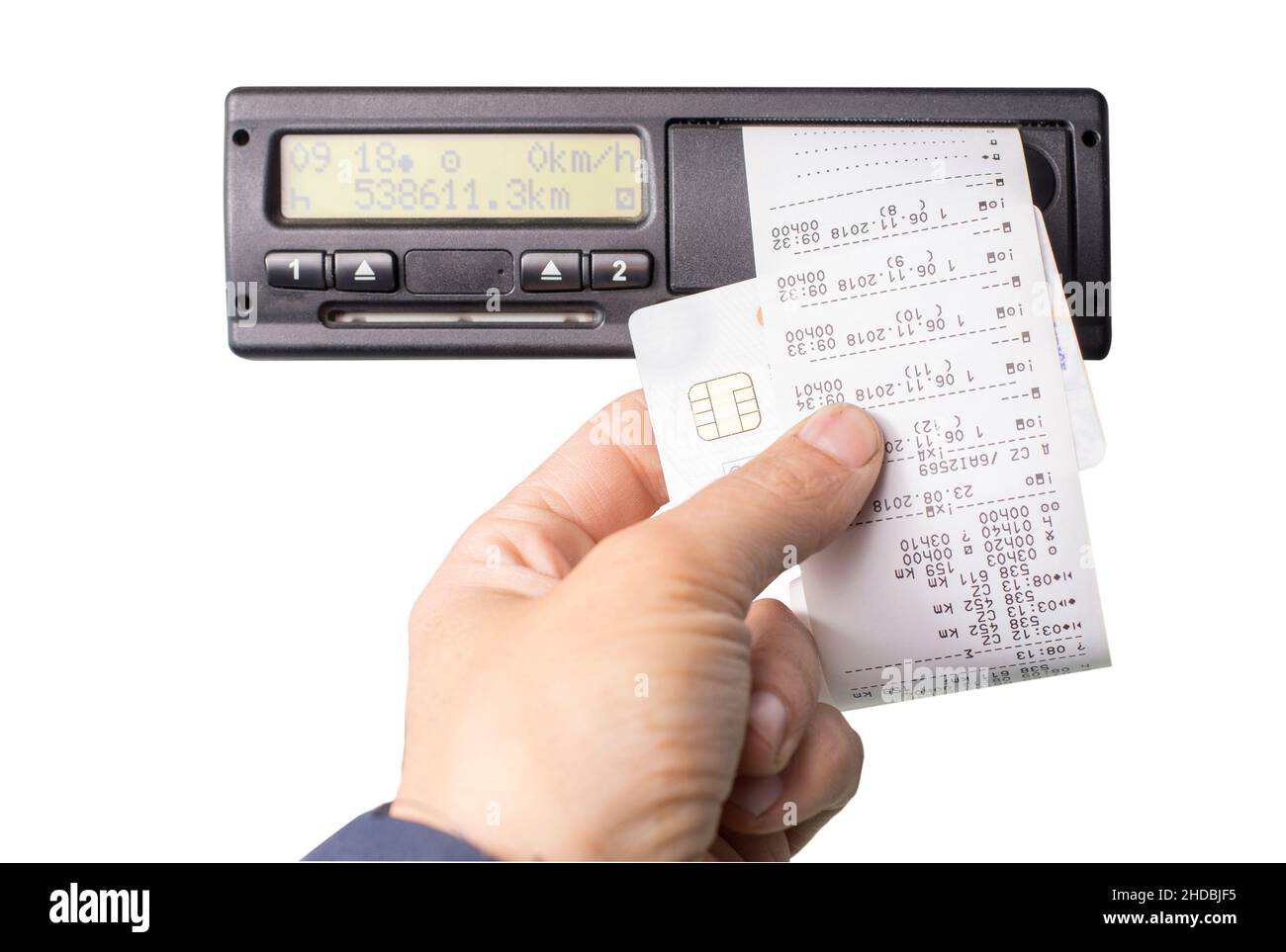 Digital tachograph and drivers hand holding print with driving times of