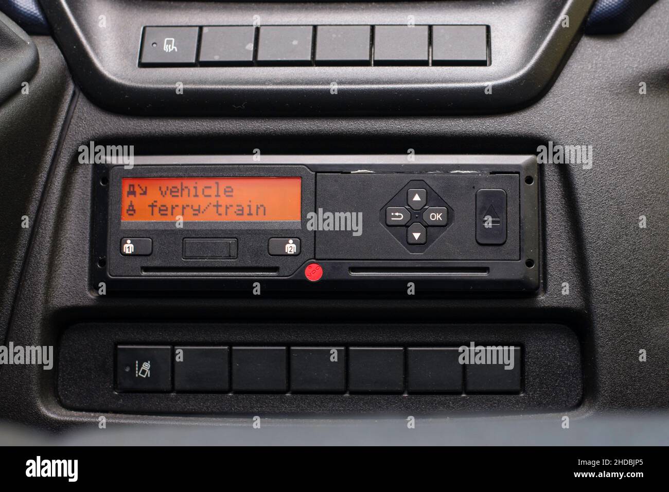 Digital tachograph display reads Vehicle Ferry Train. No personal data