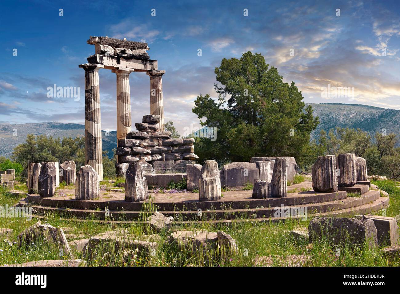 The circular Delphi Tholos temple with Doric columns, 380 BC, Sanctuary of Athena Pronaia, Delphi Archaeological Site,  Greece Stock Photo