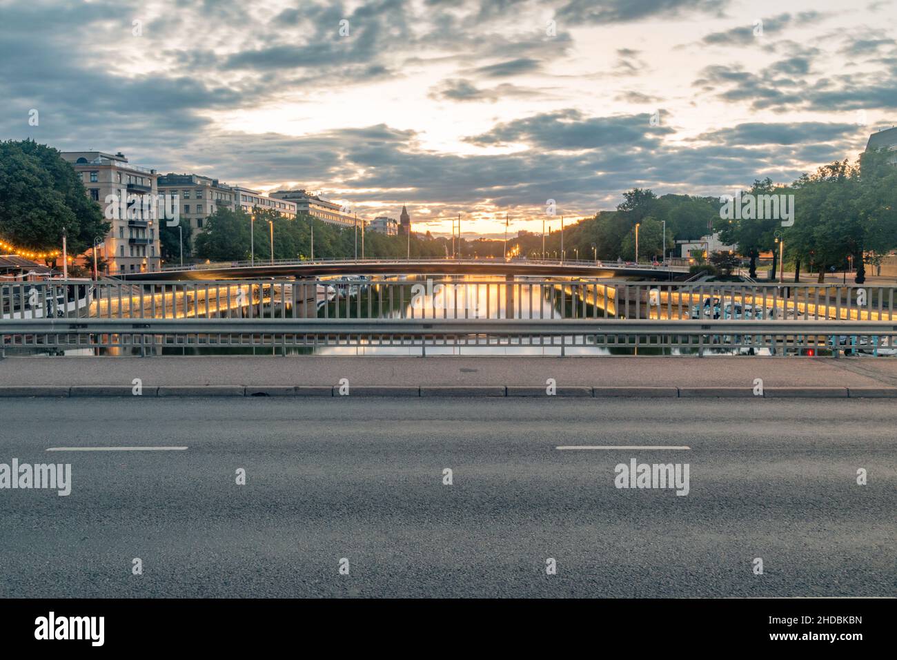 Sunrise on bridge over Aura (Aurajoki) river in Turku, Finland. Stock Photo