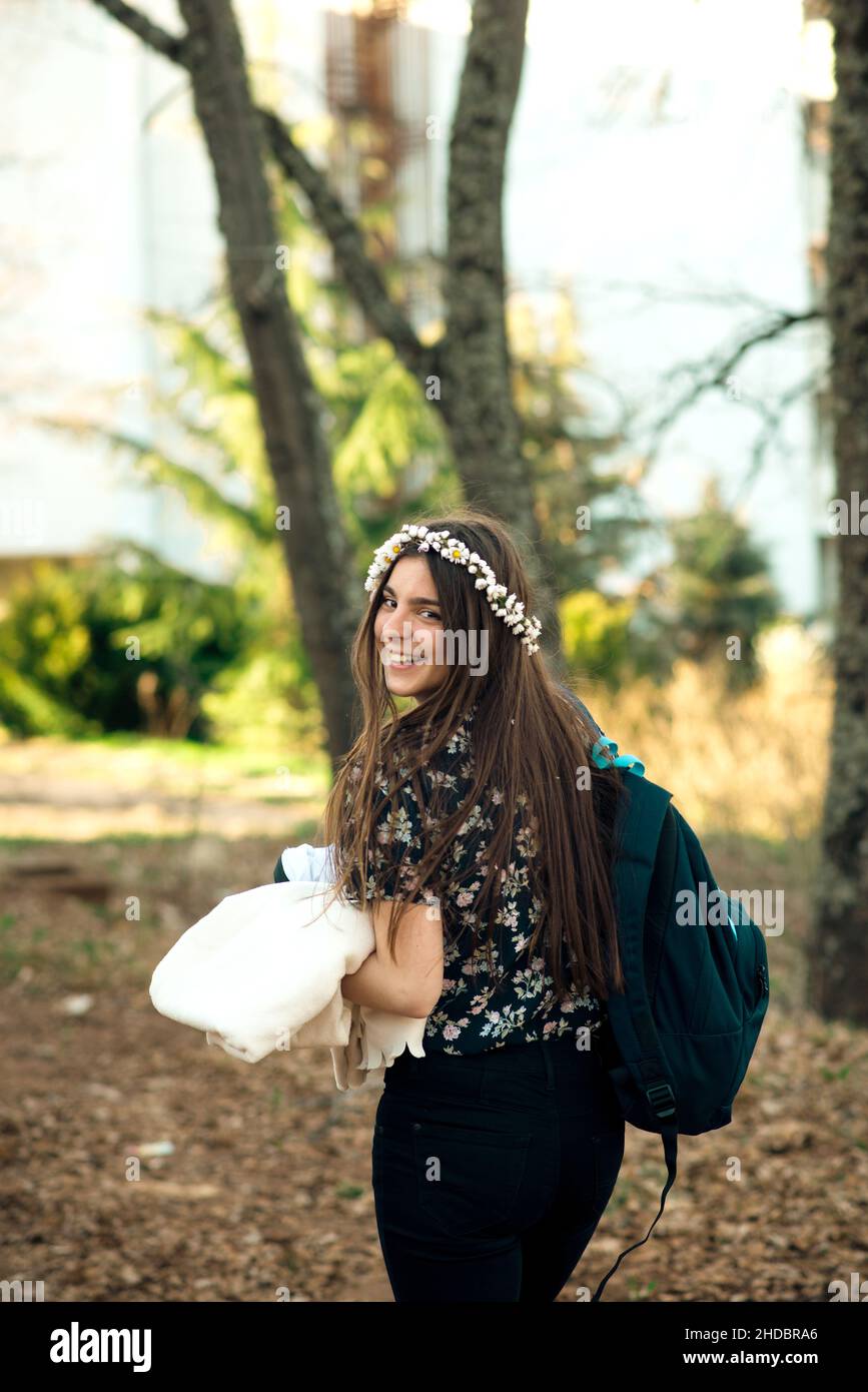 cute girl with chamomiles on hair Stock Photo - Alamy