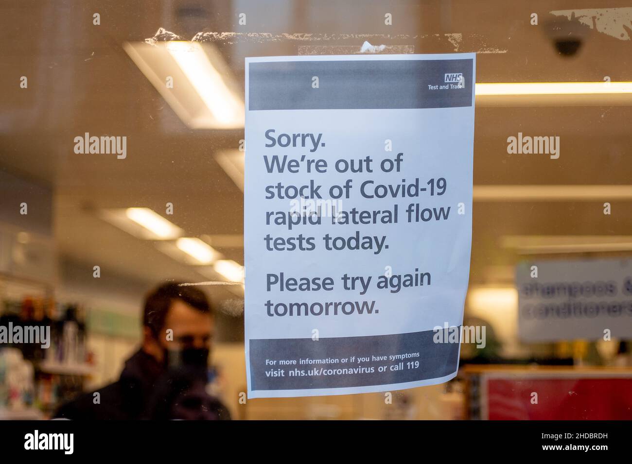 Egham, Surrey, UK. 5th January, 2022. A sign in a pharmacy window in Egham town centre tells customers that there are no stocks of Covid-19 Lateral Flow tests available today. Yesterday the UK had the highest ever number of positive Covid-19 cases recorded, however, Prime Minister Boris Johnson is not taking any further measures to reduce the spread of the disease. Credit: Maureen McLean/Alamy Live News Stock Photo