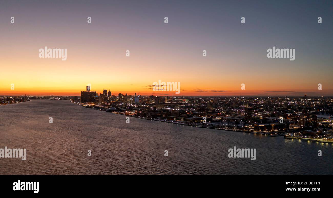 Detroit, Michigan - The city of Detroit, on the Detroit River, after sunset. Stock Photo