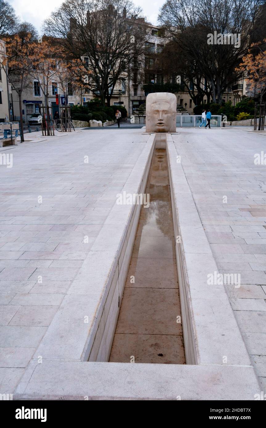 Fountain rill of Place d'Assas in Nîmes, France. Stock Photo