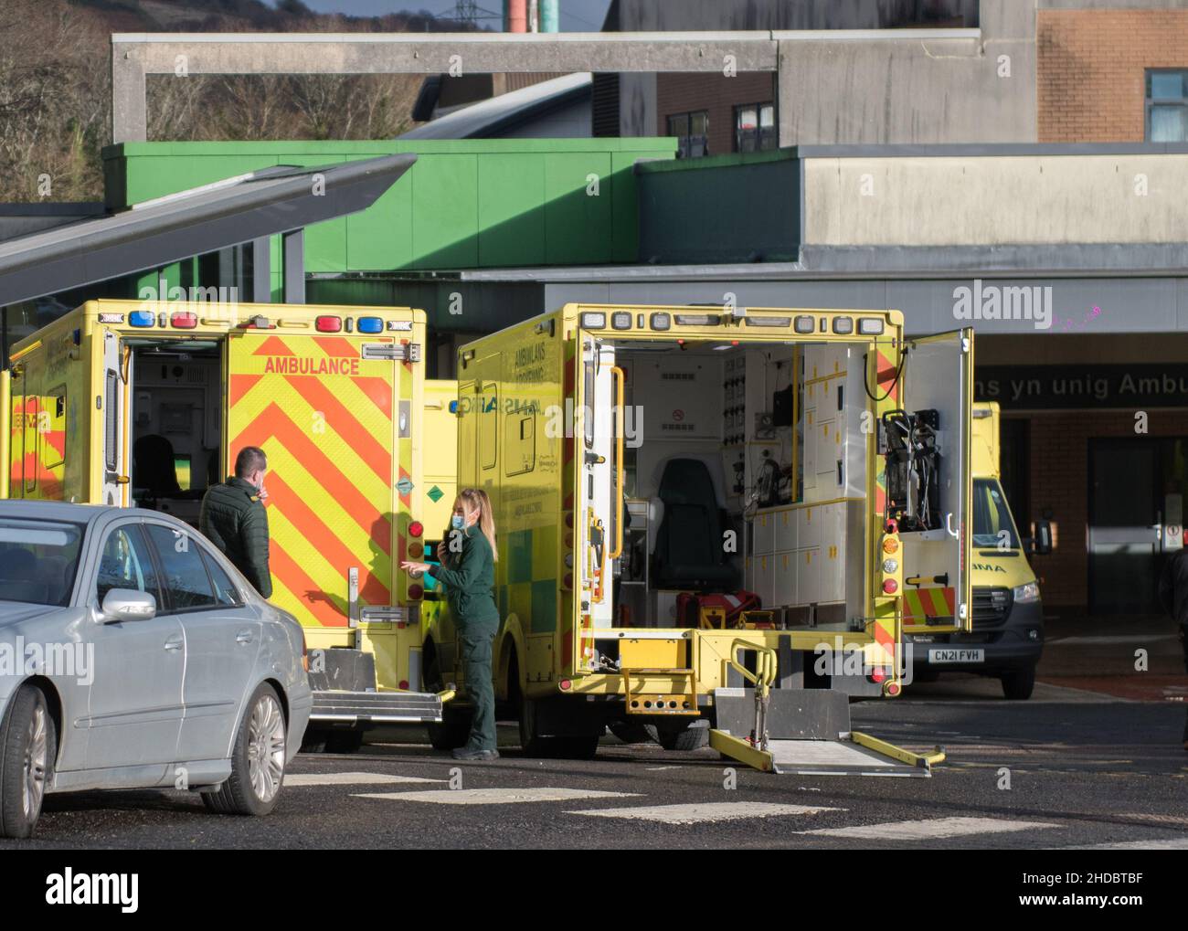 Ambulances, many holding patients, are stacked outside Morriston