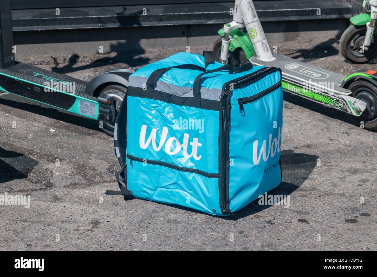 Helsinki, Finland - August 5, 2021: Wolt delivery bag. Wolt is food delivery service. Stock Photo