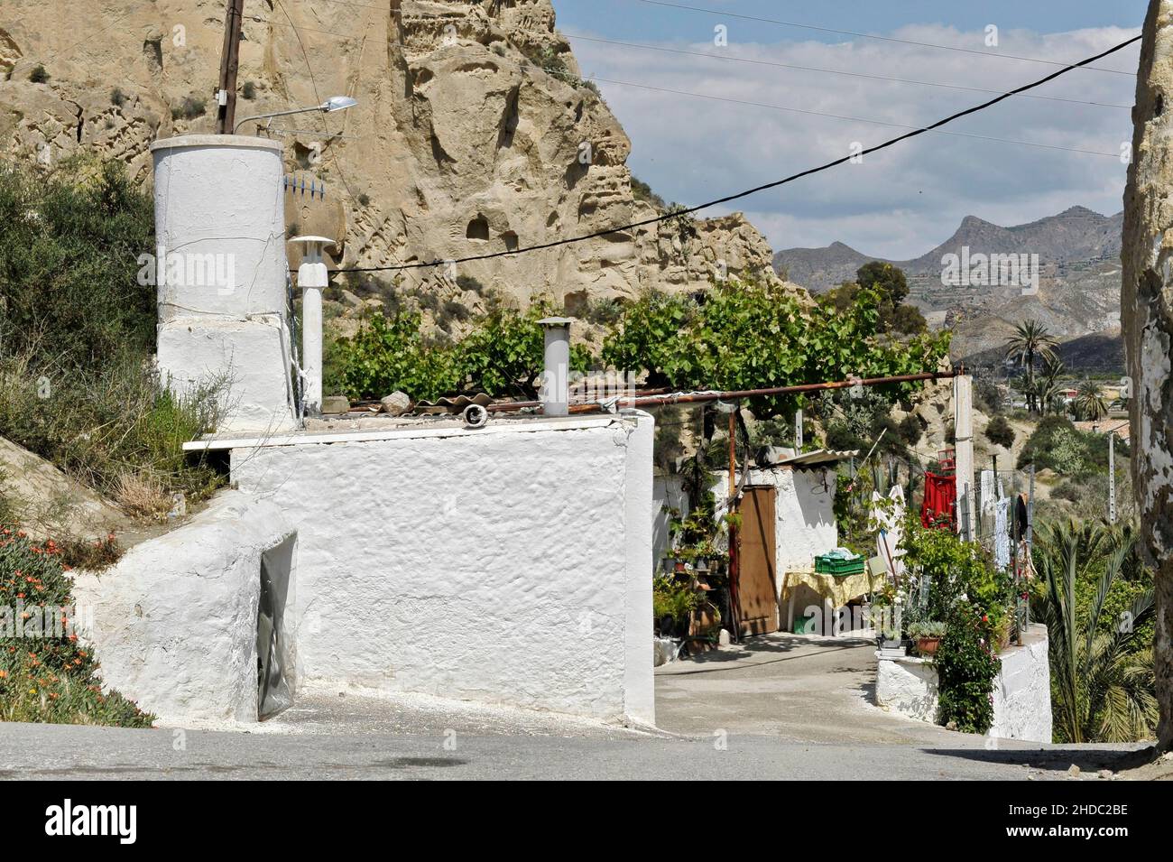 White cave house in front of rocks, Calguerin, Cuevas del Almanzora, Andalucia, Spain, Europe Stock Photo