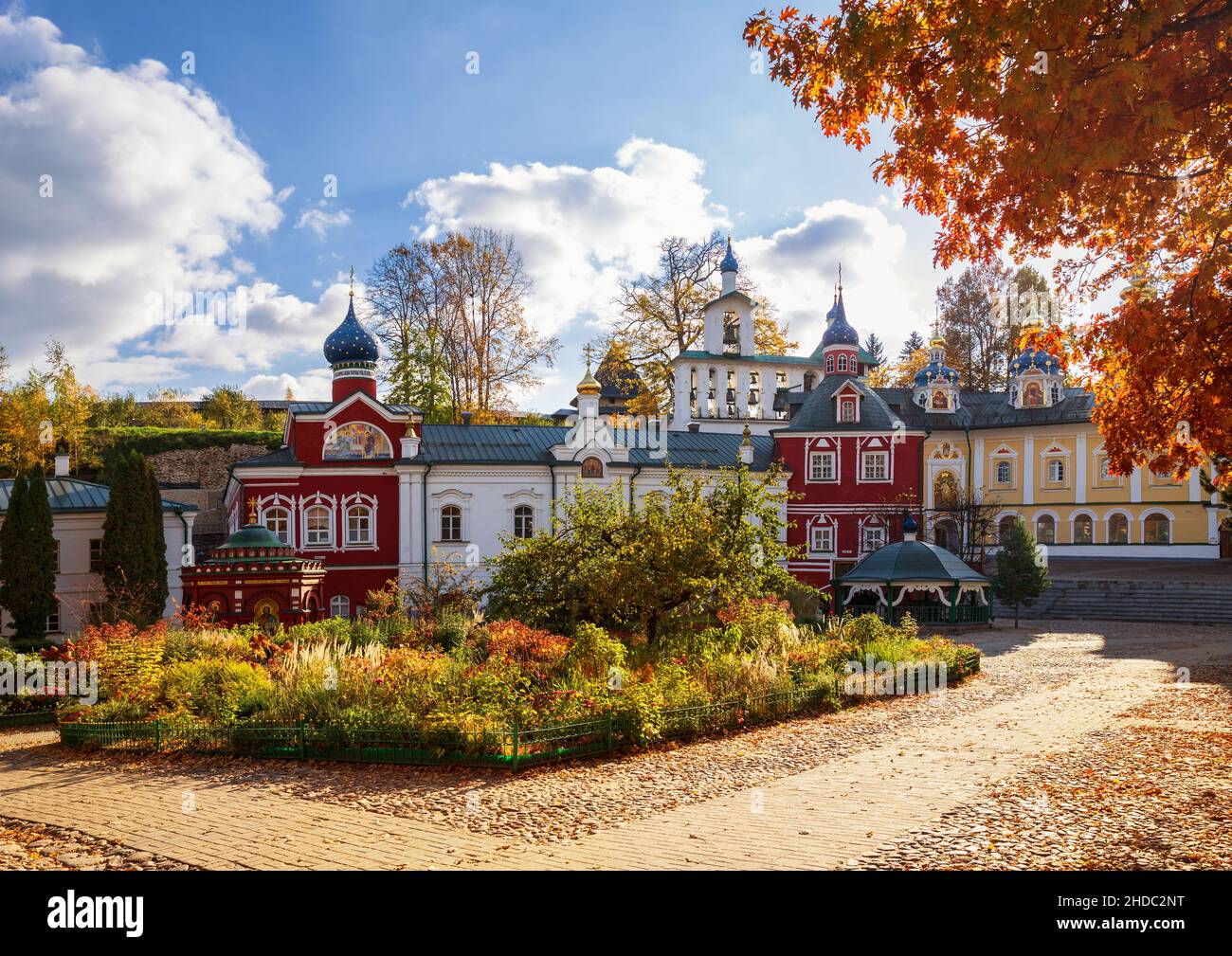 Pskov-Caves or Pskovo-Pechersky Dormition Monastery on a sunny autumn day. Pskov region, Russia Stock Photo